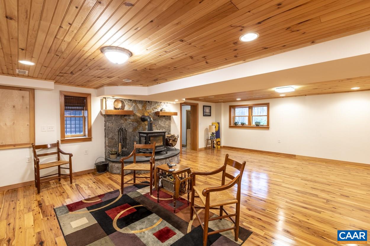 1151 Ridgeview Road Reva, VA 22735 - Photo 52 of 74 a living room with furniture and a wooden floor