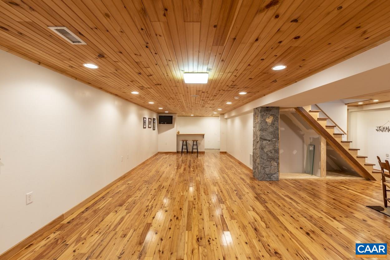 1151 Ridgeview Road Reva, VA 22735 - Photo 58 of 74 a view of a hallway with wooden floor