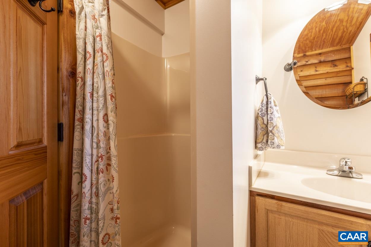 1151 Ridgeview Road Reva, VA 22735 - Photo 68 of 74 a bathroom with a sink and a mirror
