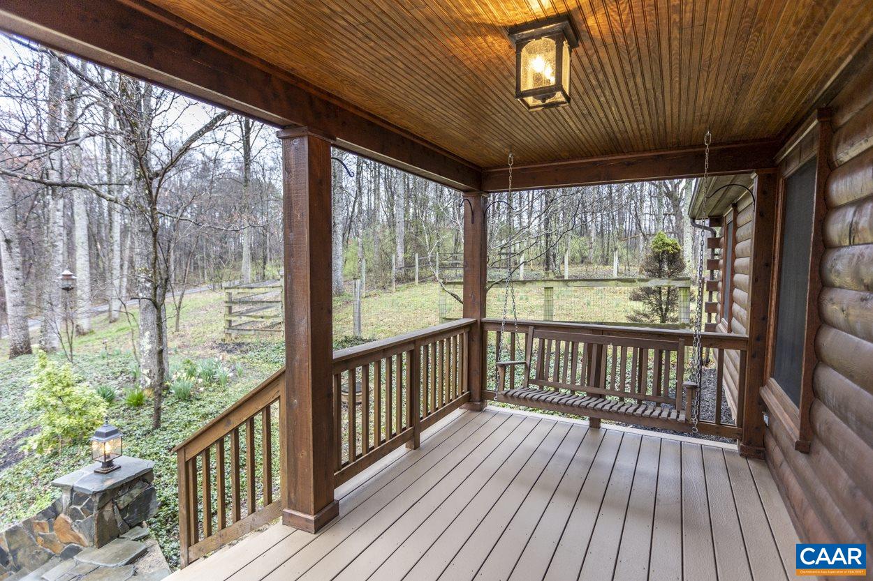 1151 Ridgeview Road Reva, VA 22735 - Photo 7 of 74 a view of a balcony with wooden floor