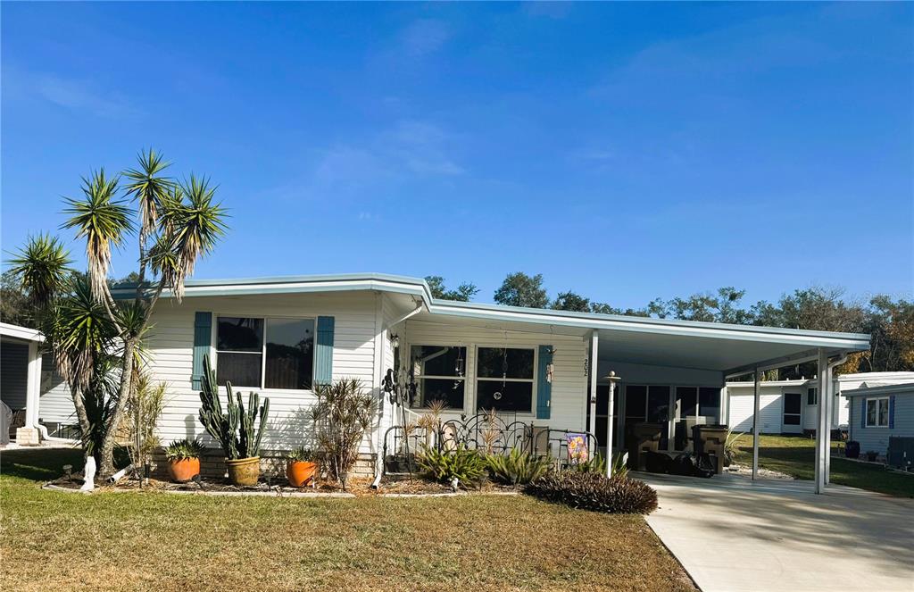 a front view of a house with a porch