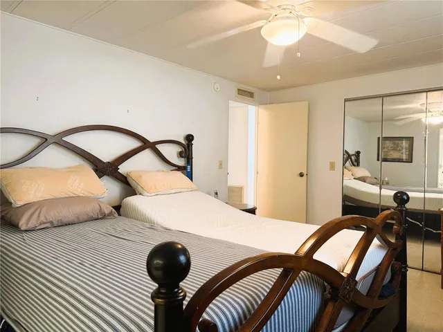 a bathroom with a sink a toilet a shower and a mirror