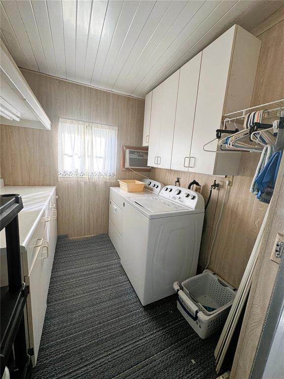 202 Aspen Circle Leesburg, FL 34748 - Photo 30 of 34 a utility room with cabinets washer and dryer