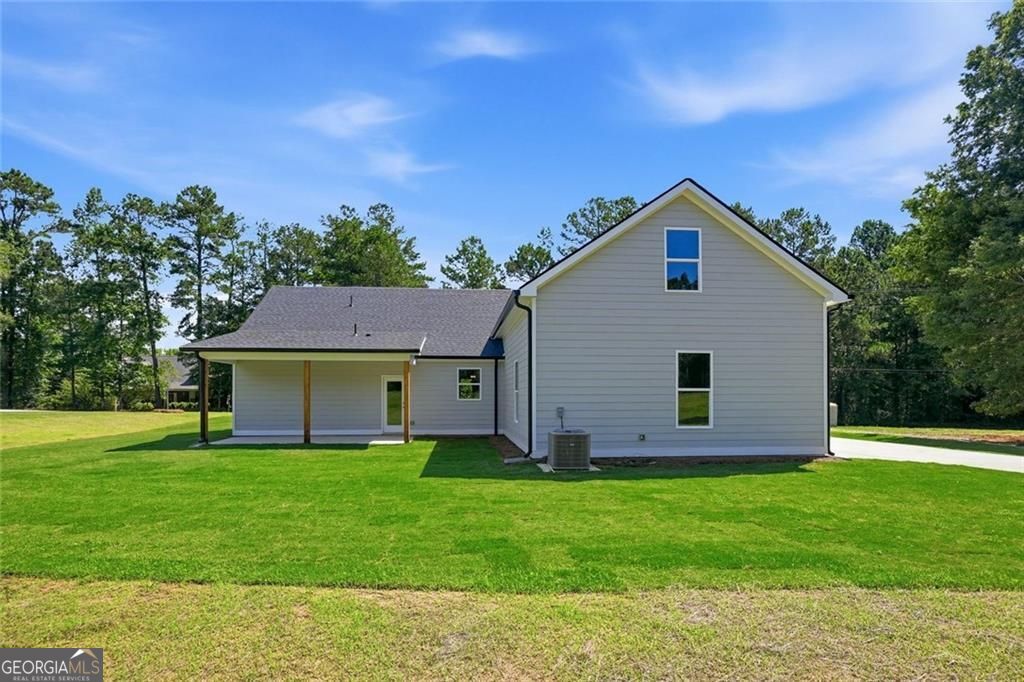 160 Loyd Road Mansfield, GA 30056 - Photo 33 of 52 a view of a house with a yard