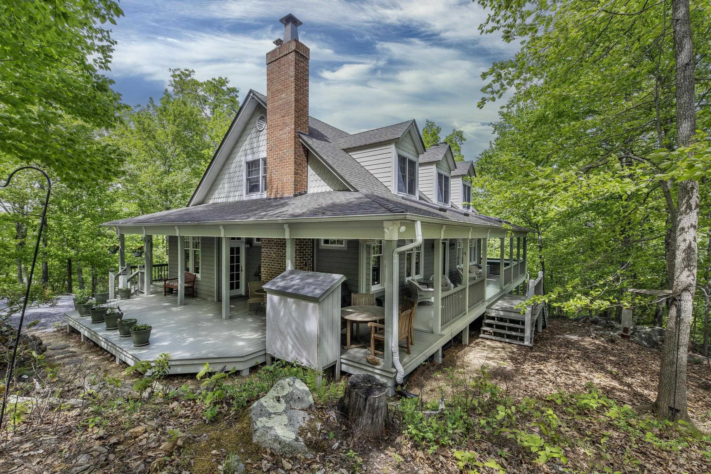 151 Stonebrook Road Amherst, VA 24521 - Photo 2 of 74 Wrap around, covered porches offer plenty of areas to entertain, or curl up with a good book.