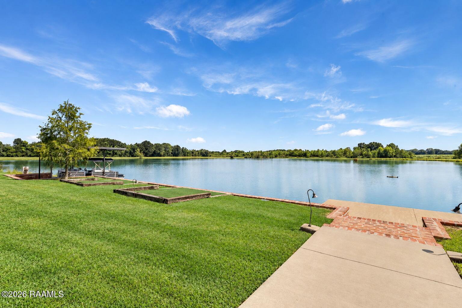 433 Langlinais Road Youngsville, LA 70592 - Photo 51 of 56 97-web-or-mls-Pond Tee Boxes and Boat 43