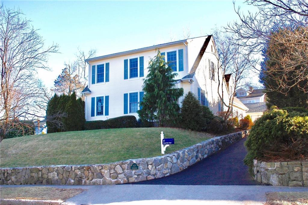 a house view with a garden space