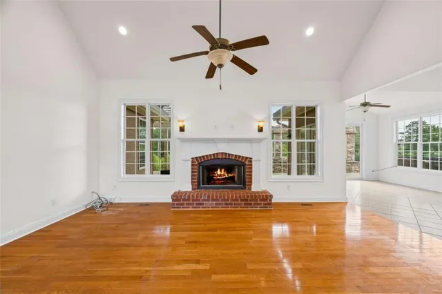 a kitchen with stainless steel appliances granite countertop a sink and a window