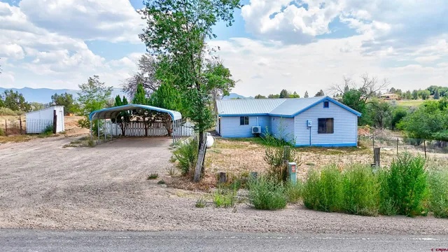 a house view with a garden space