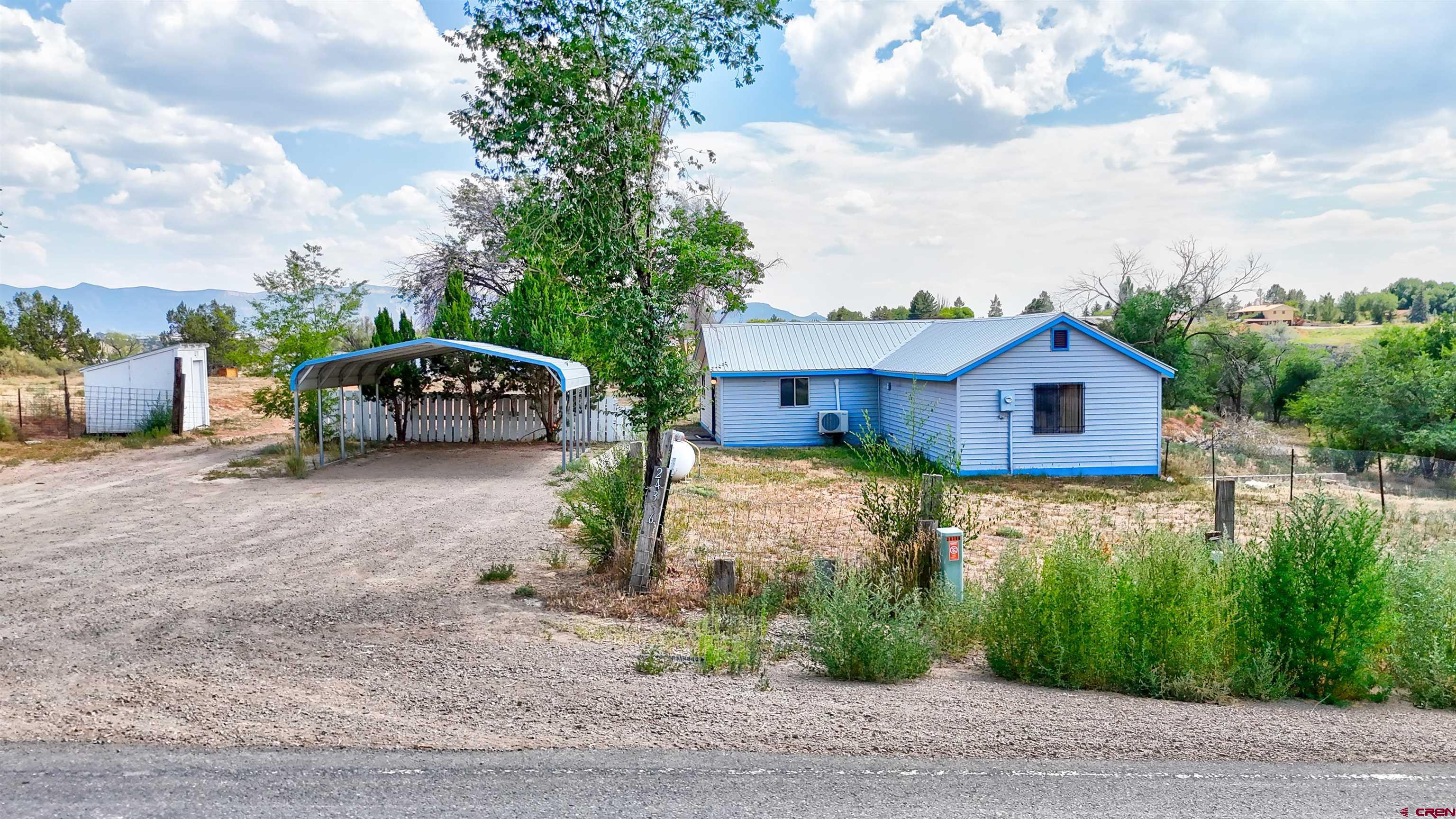 a house view with a garden space