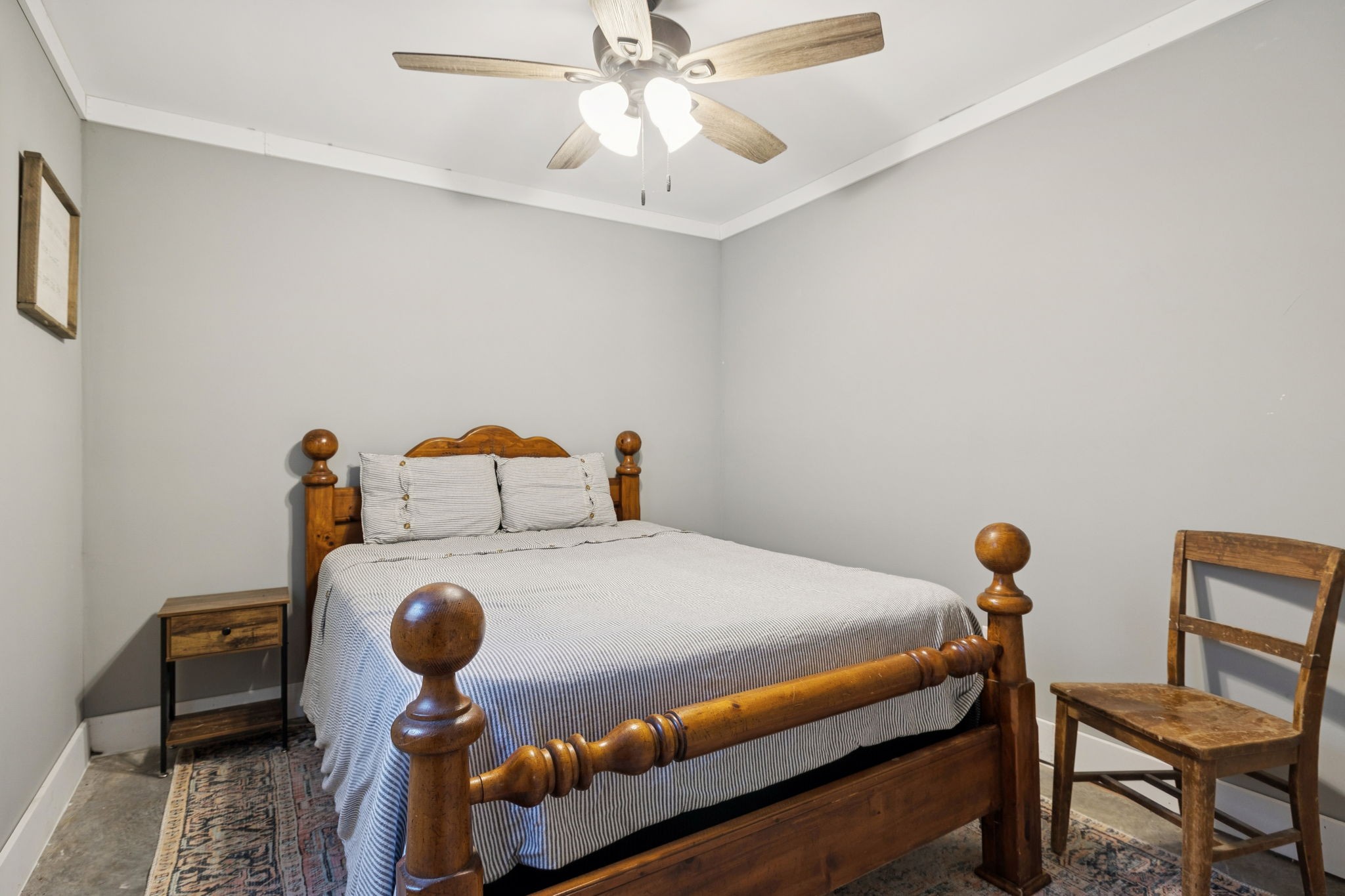 1399 Roberts Creek Road Waverly, TN 37185 - Photo 14 of 42 a bedroom with furniture and a bed