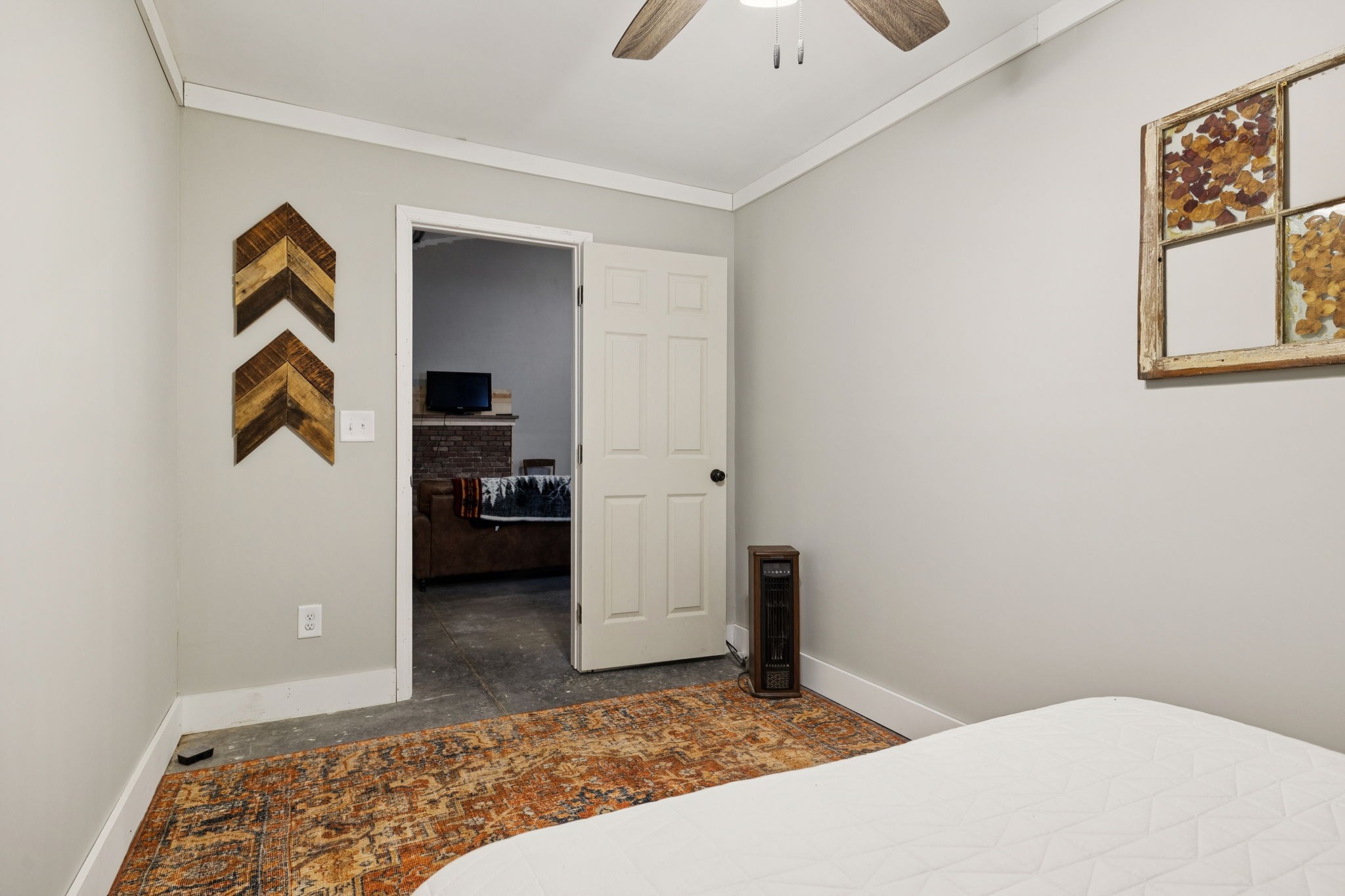 1399 Roberts Creek Road Waverly, TN 37185 - Photo 19 of 42 a bedroom with a bed and a view of bathroom