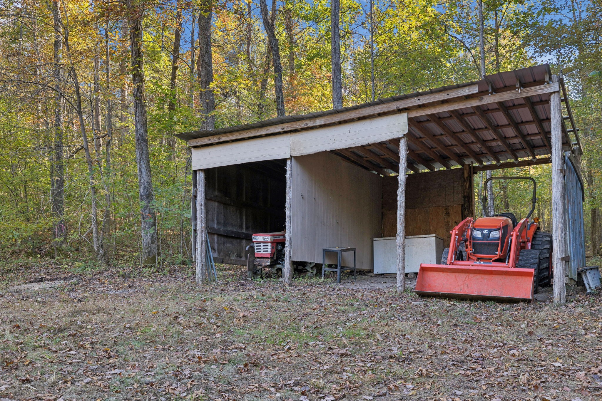 1399 Roberts Creek Road Waverly, TN 37185 - Photo 26 of 42 a view of house with couch and outdoor seating