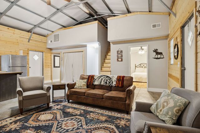 a living room with furniture and a couch