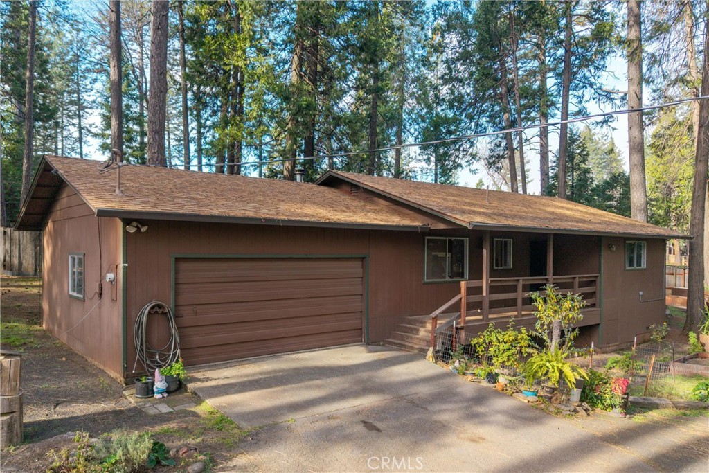 15353 Forest Ranch Way Forest Ranch, CA 95942 - Photo 1 of 47 a backyard of a house with table and chairs