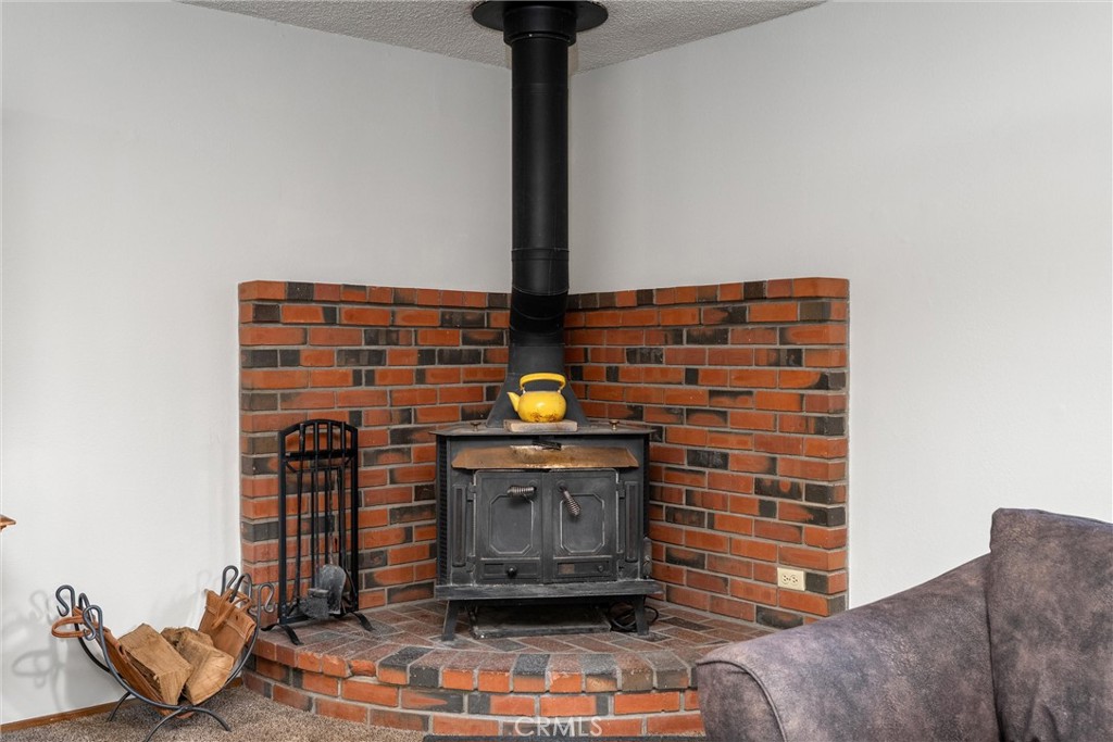 15353 Forest Ranch Way Forest Ranch, CA 95942 - Photo 12 of 47 a view of livingroom with fireplace