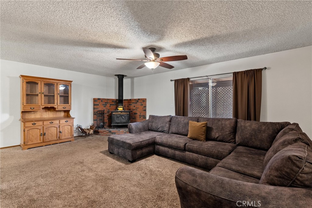 15353 Forest Ranch Way Forest Ranch, CA 95942 - Photo 2 of 47 a living room with furniture and a large window