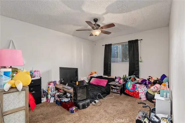 a backyard of a house with yard and outdoor seating