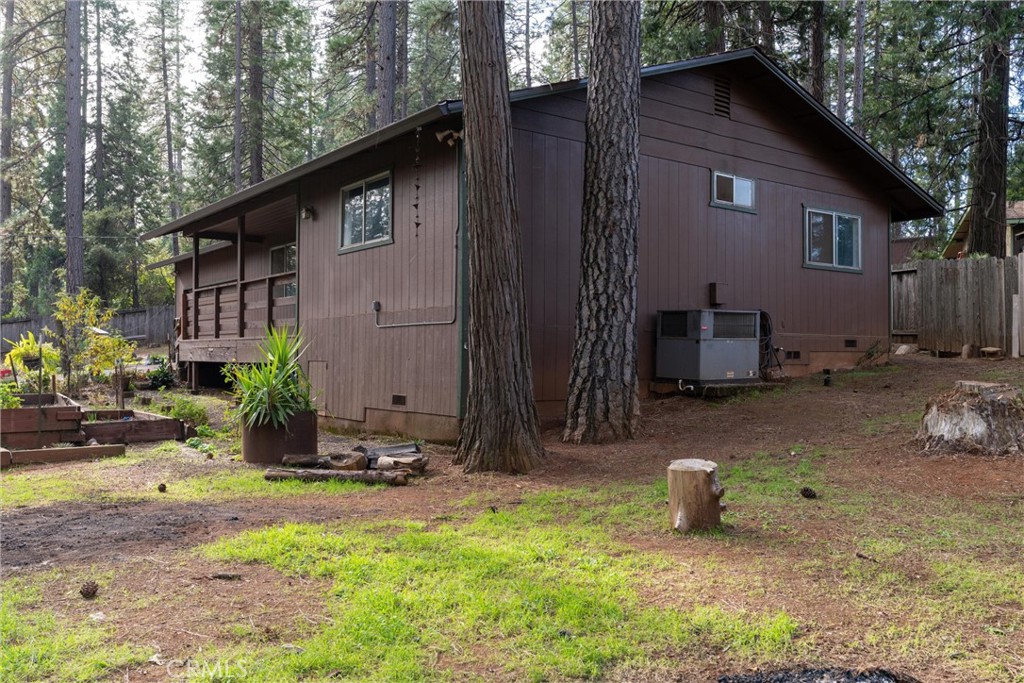 15353 Forest Ranch Way Forest Ranch, CA 95942 - Photo 27 of 47 a backyard of a house with yard and outdoor seating
