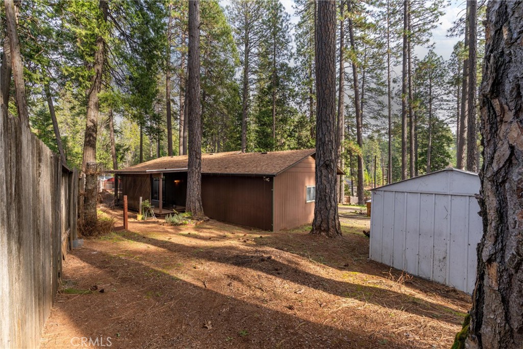 15353 Forest Ranch Way Forest Ranch, CA 95942 - Photo 28 of 47 a view of a house with backyard and trees