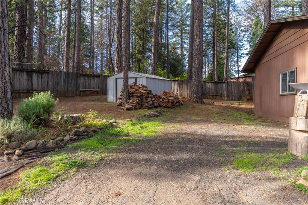 15353 Forest Ranch Way Forest Ranch, CA 95942 - Photo 42 of 47 a view of a backyard with tree