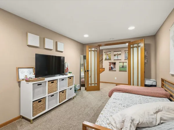 an aerial view of a house with outdoor space and lake view