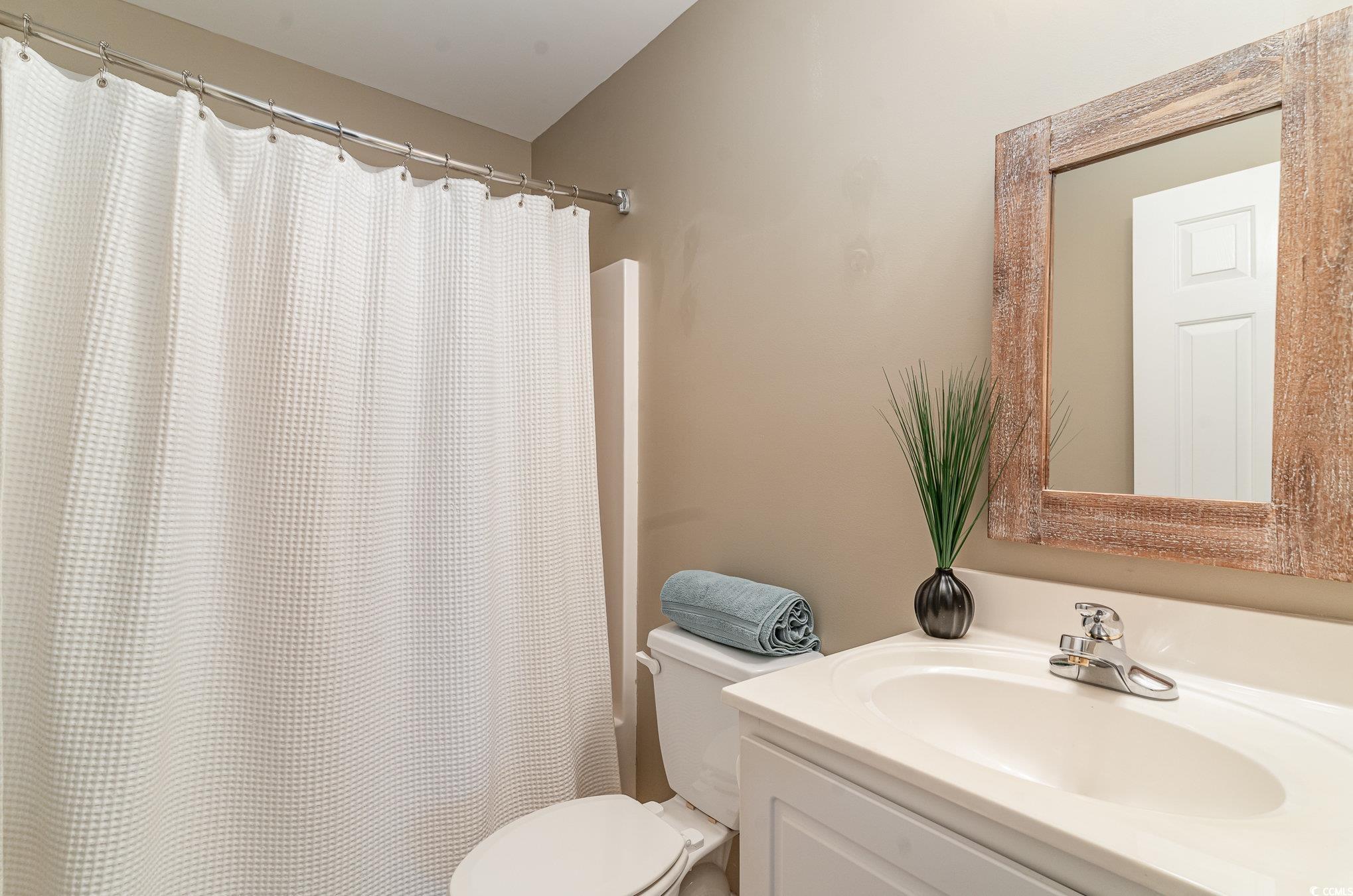 3533 Arrowhead Boulevard Myrtle Beach, SC 29579 - Photo 24 of 31 Bathroom featuring vanity and toilet