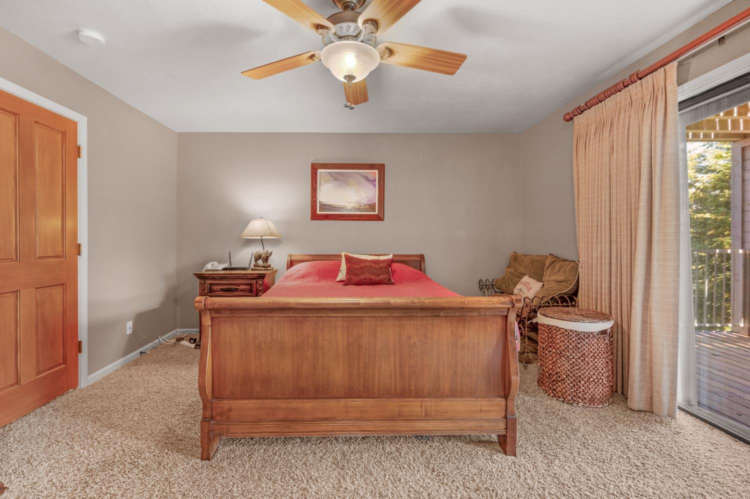 63217 Huntington Vista Road, Unit 81 Mono Hot Springs, CA 93642 - Photo 13 of 53 a bedroom with a bed and a chandelier