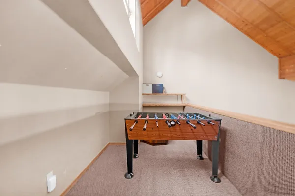 a view of balcony with wooden floor