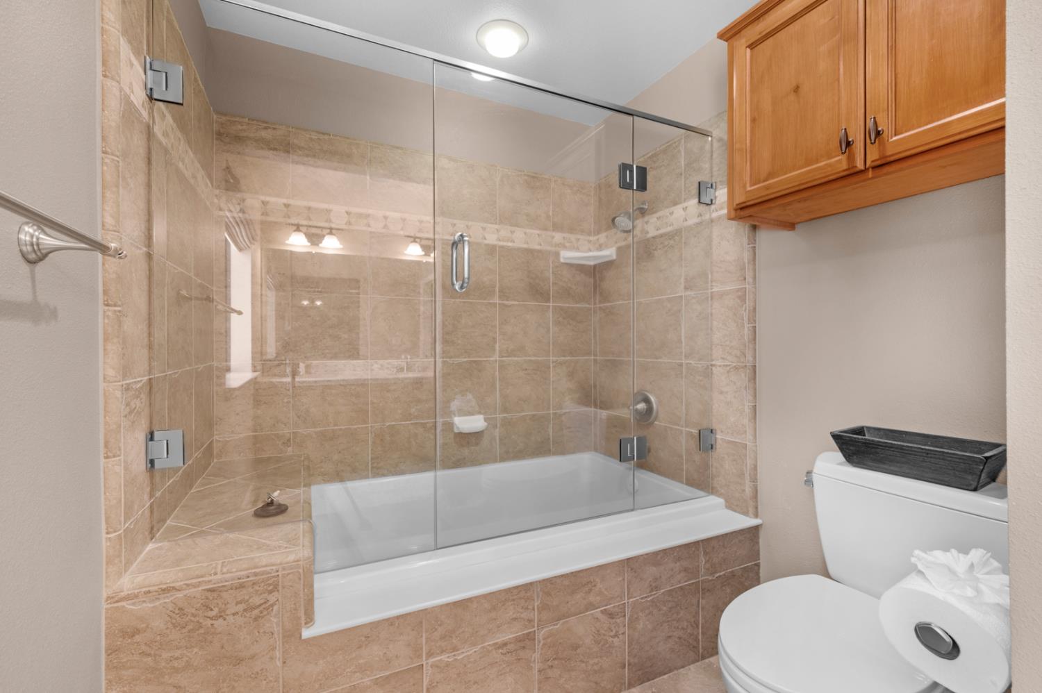 63217 Huntington Vista Road, Unit 81 Mono Hot Springs, CA 93642 - Photo 43 of 53 a bathroom with a sink a toilet and shower