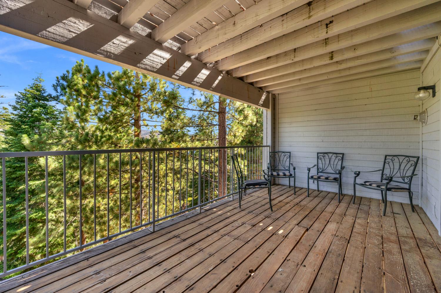 63217 Huntington Vista Road, Unit 81 Mono Hot Springs, CA 93642 - Photo 53 of 53 a view of a chairs and table on the wooden floor