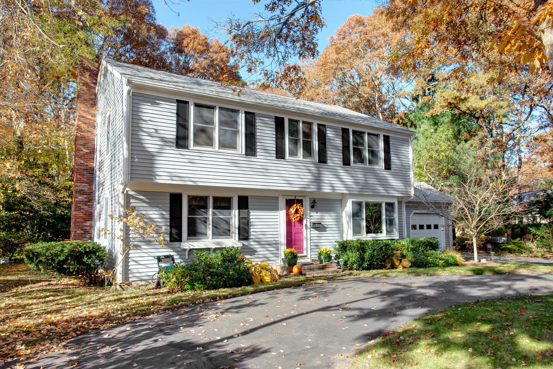 36 Tuckernuck Road Centerville, MA 02632 - Photo 41 of 45 a front view of a house with a yard