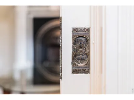 a close up of a utility room with a door