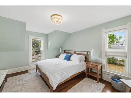 a view of a room with a large window