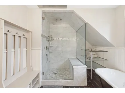 a view of roof deck with furniture and garden