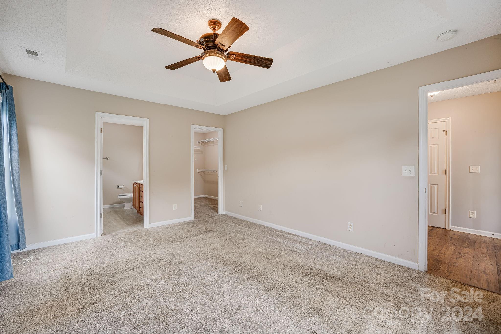 59 Yadkin Road Fletcher, NC 28732 - Photo 23 of 35 wooden floor in an empty room