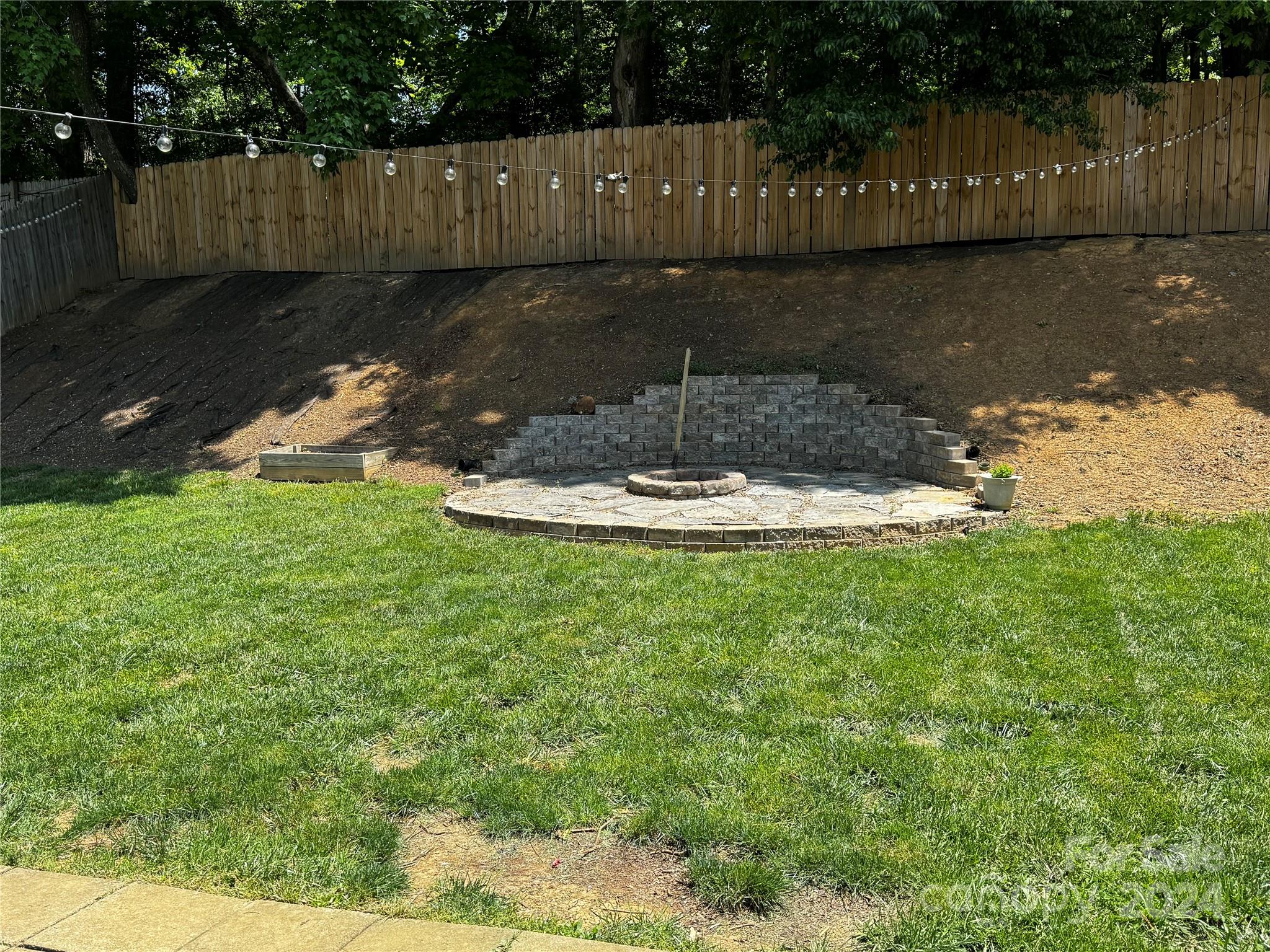 59 Yadkin Road Fletcher, NC 28732 - Photo 29 of 35 a swimming pool with wooden fence