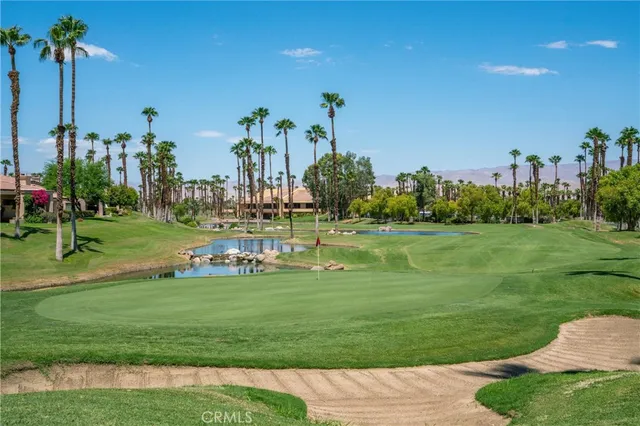 a view of a park with houses