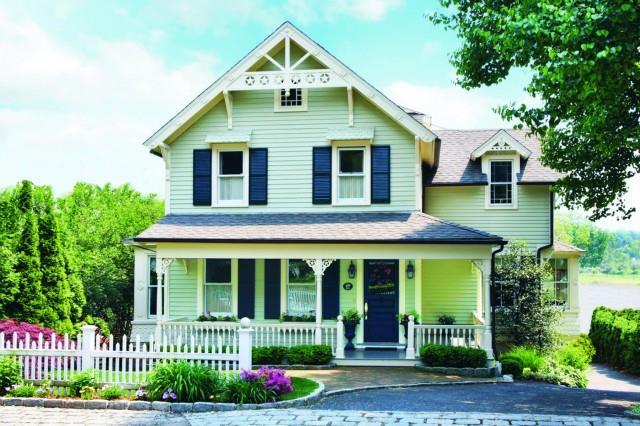 a front view of a house with a porch