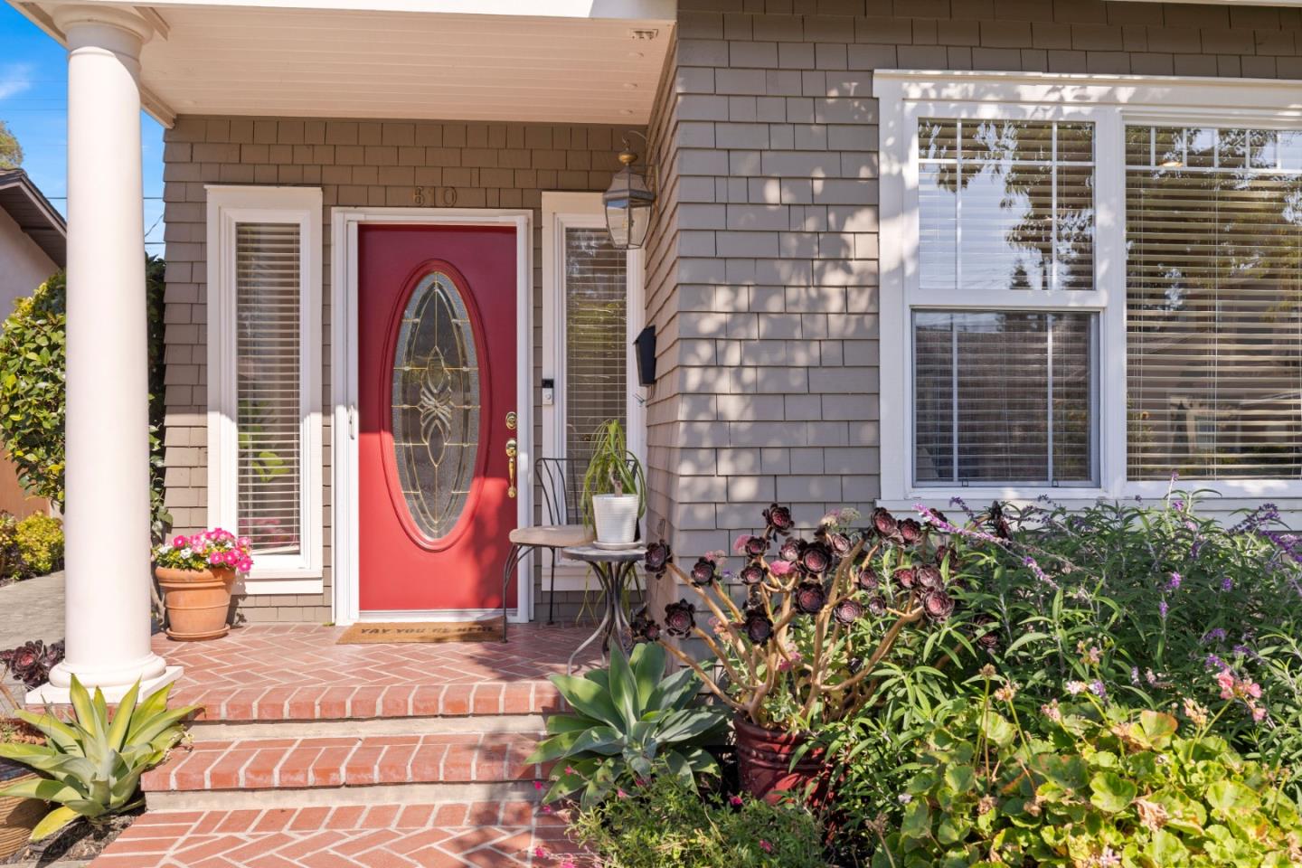 610 Gilroy Drive Capitola, CA 95010 - Photo 2 of 36 a front view of a house with a garden