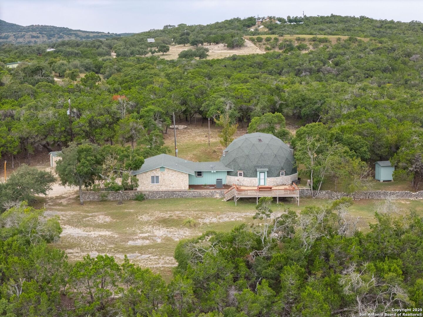 448 Red Rock Road Blanco, TX 78606 - Photo 26 of 52 an aerial view of a house with a yard and lake view