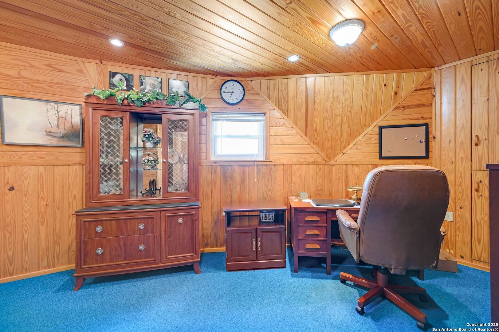 448 Red Rock Road Blanco, TX 78606 - Photo 38 of 52 a view of a workspace with furniture and wooden floor