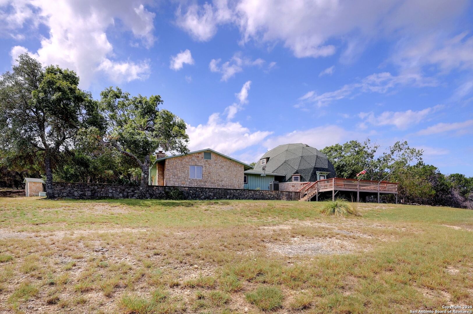 448 Red Rock Road Blanco, TX 78606 - Photo 45 of 52 a view of a house with swimming pool and a yard
