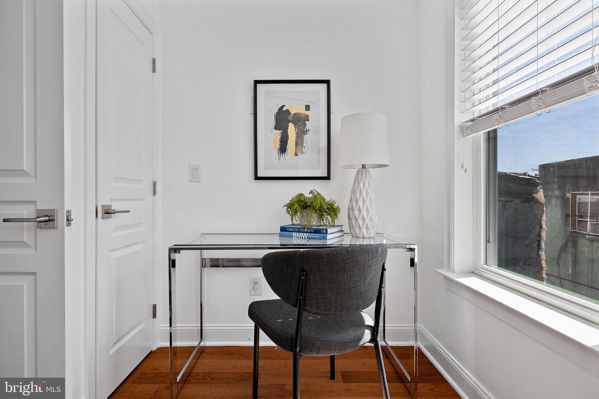 432 Mercy Street Philadelphia, PA 19148 - Photo 15 of 36 a view of a dining room with furniture window and wooden floor