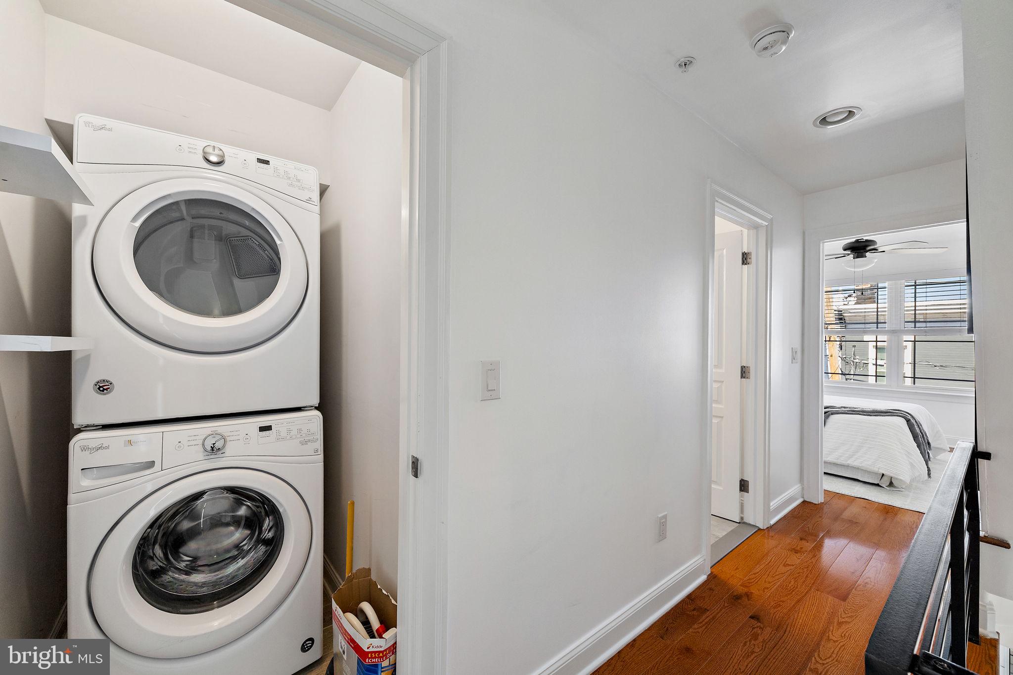 432 Mercy Street Philadelphia, PA 19148 - Photo 16 of 36 a view of a hallway with washer and dryer