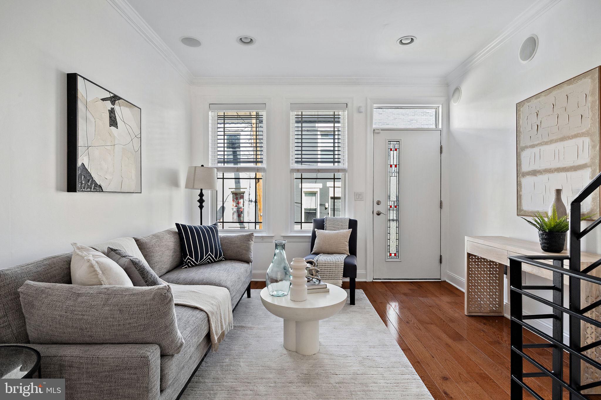 432 Mercy Street Philadelphia, PA 19148 - Photo 2 of 36 a living room with furniture and wooden floor