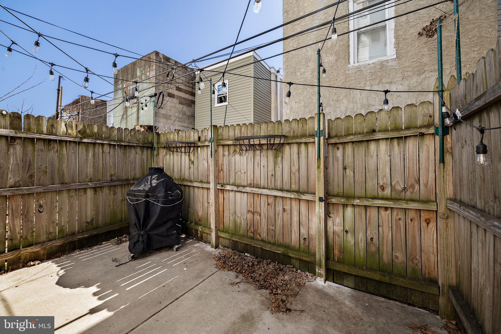 432 Mercy Street Philadelphia, PA 19148 - Photo 32 of 36 a view of a balcony with wooden fence
