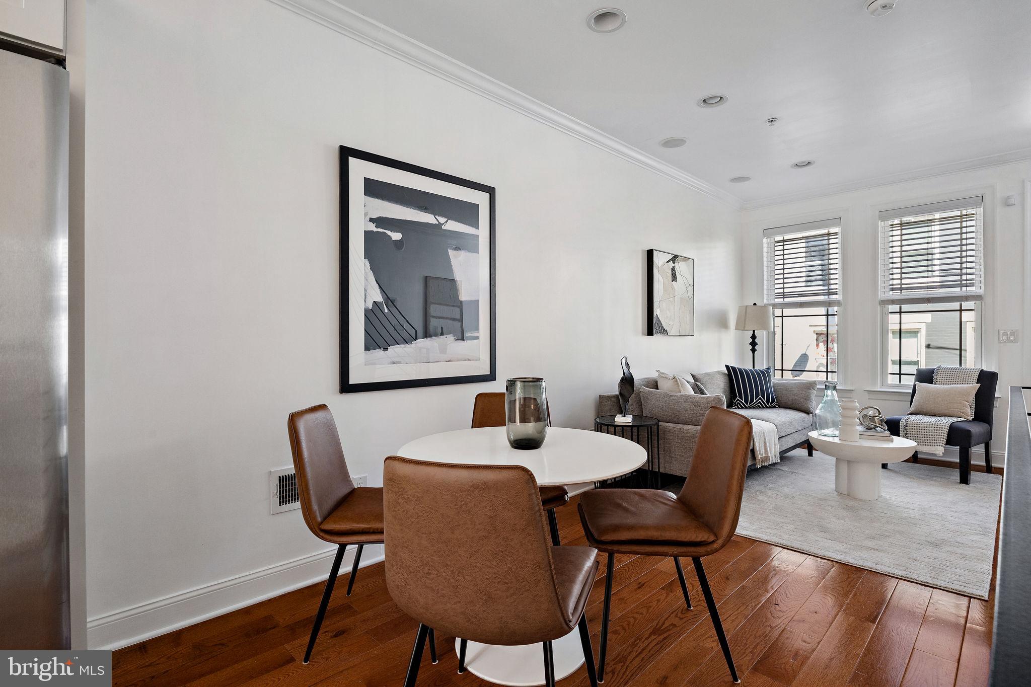 432 Mercy Street Philadelphia, PA 19148 - Photo 5 of 36 a dining room with furniture and wooden floor