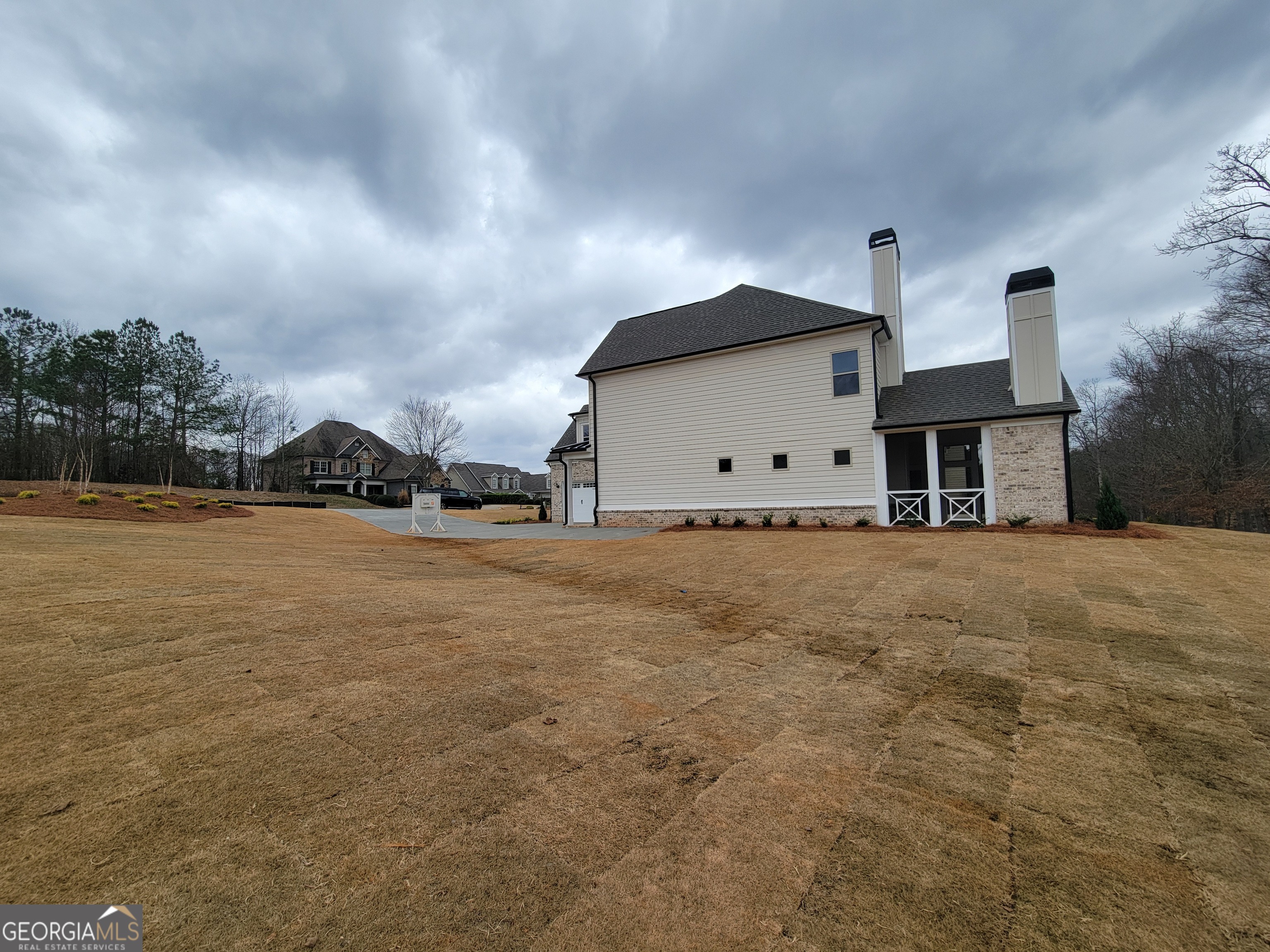 1960 Duncans Mill Lane, Unit 38N Jefferson, GA 30549 - Photo 25 of 26 a view of garage and yard