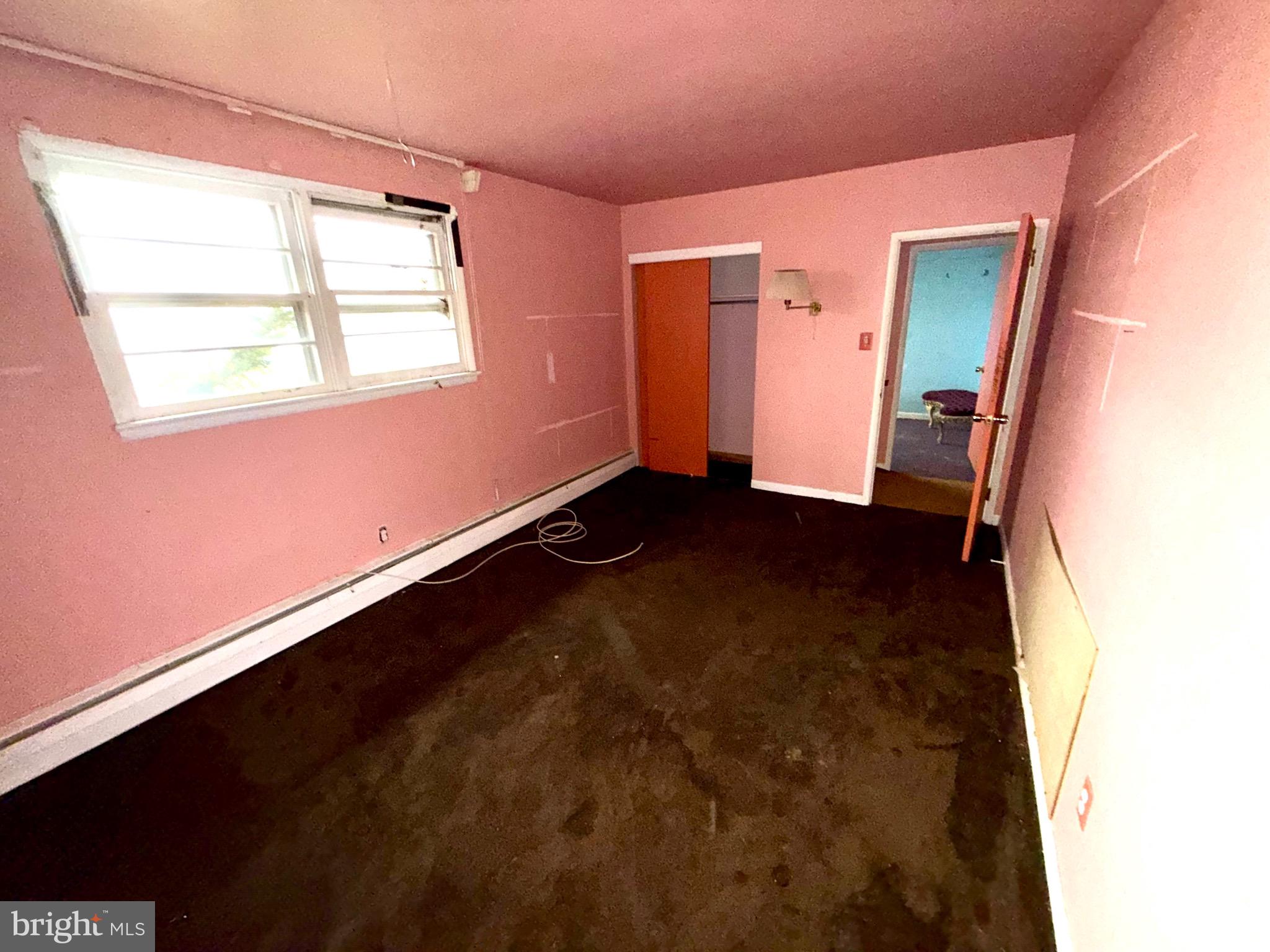 1053 Clayton Road Williamstown, NJ 08094 - Photo 12 of 24 a view of an empty room and a windows